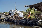 Tonle Sap - Kampong Phluk floating village - stilted houses 